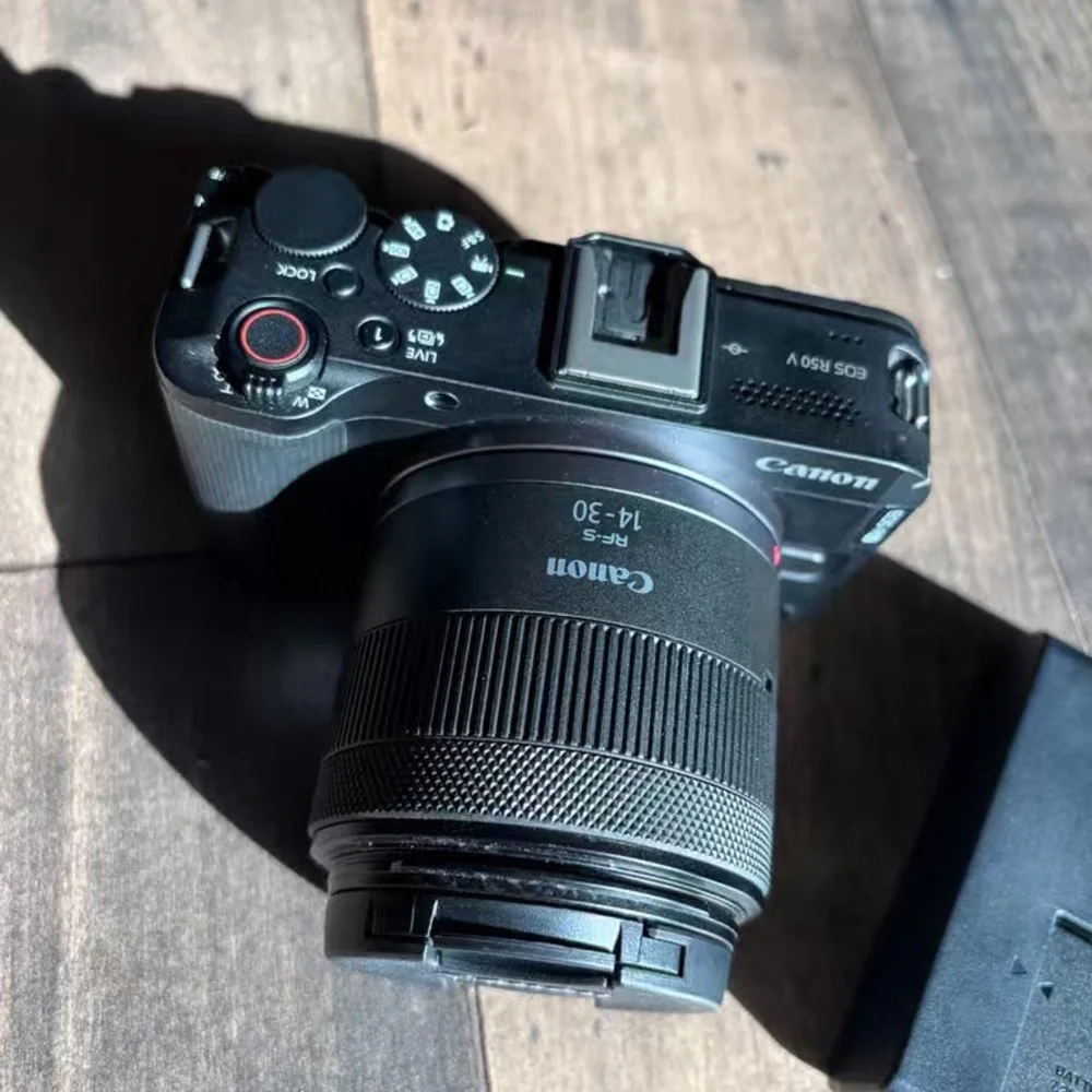 Canon Black Mirrorless Camera with 14-30mm Lens and Charger
